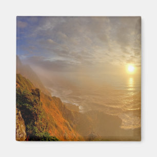 Sun sets over the Pacific Ocean from Heceta Magnet