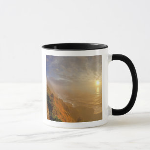 Sun sets over the Pacific Ocean from Heceta Mug