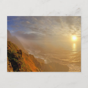 Sun sets over the Pacific Ocean from Heceta Postcard