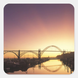 Sun setting behind the Newport Bridge, Oregon Square Sticker