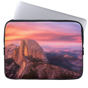 Sun Setting over A Rocky Landscape Laptop Sleeve