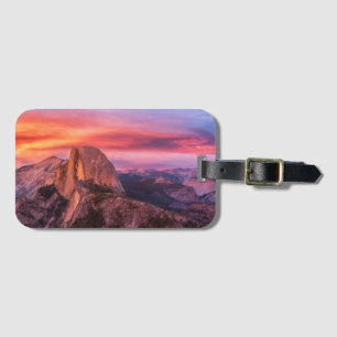 Sun Setting over A Rocky Landscape Luggage Tag