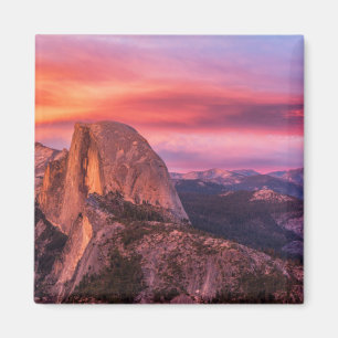 Sun Setting over A Rocky Landscape Magnet
