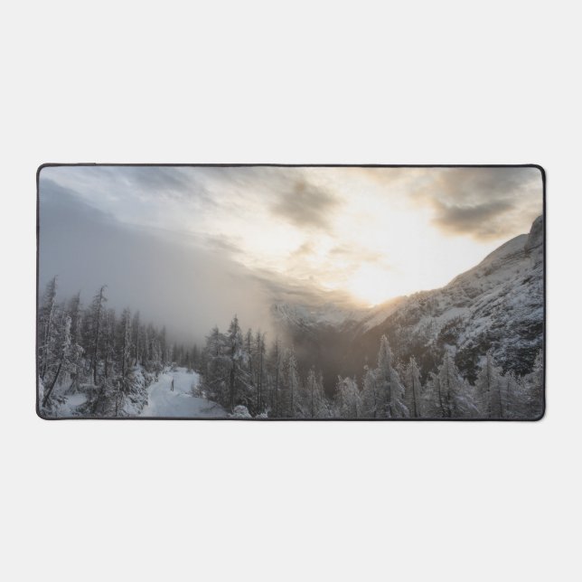 Sun shining at stunning winter scenery desk mat (Front)