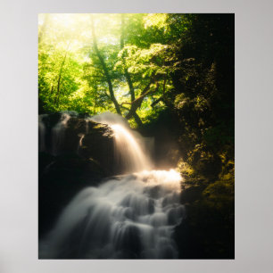Sun shining on a magical waterfall poster