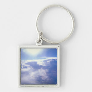 Sun shinning through clouds key ring