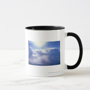 Sun shinning through clouds mug