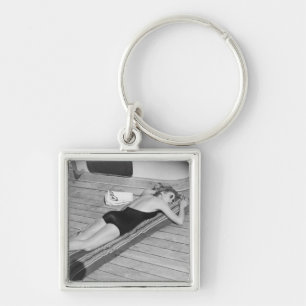 Sun Tanning Woman Key Ring