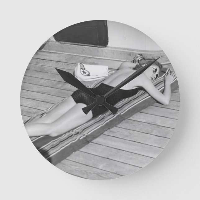 Sun Tanning Woman Round Clock (Front)