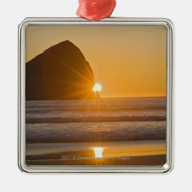 Sunburst And Haystack Rock At Cape Kiwanda Metal Ornament (Front)