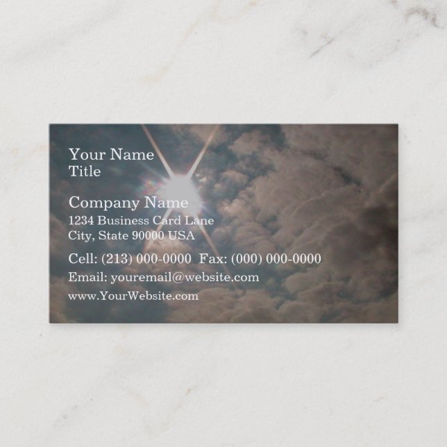 Sunburst through white clouds business card (Front)