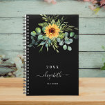 Sunflower eucalyptus greenry black name 2023 planner<br><div class="desc">A black background.  Decorated with sunflowers,  eucalyptus greenery.  Add a name,  text. The name is written with a modern hand lettered style script with swashes. 
To keep the swashes only delete the sample name,  leave the spaces or emoji's in front and after the name.</div>
