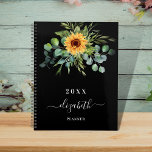 Sunflower eucalyptus greenry black name 2026 planner<br><div class="desc">A black background.  Decorated with sunflowers,  eucalyptus greenery.  Add a name,  text. The name is written with a modern hand lettered style script with swashes. 
To keep the swashes only delete the sample name,  leave the spaces or emoji's in front and after the name.</div>