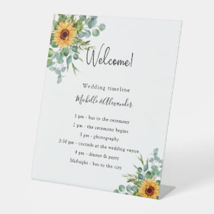 Sunflowers eucalyptus wedding program details pedestal sign