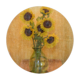 Sunflowers in vase on table 2 cutting board