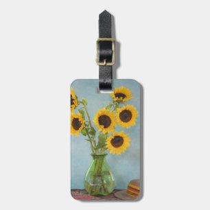 Sunflowers in vase on table luggage tag