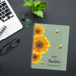 Sunflowers yellow bees sage green name  planner<br><div class="desc">Stay organised in style with our Personalised Sunflower and Bee Spiral Planner, featuring a charming design inspired by nature's beauty. Perfect for planning your days with a touch of whimsy, this planner combines functionality with a delightful aesthetic. Sage green Background: The soft beige backdrop provides a soothing and neutral canvas,...</div>