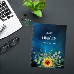 Sunflowers yellow blue sky name 2025 planner<br><div class="desc">Stay organised and inspired throughout the year with our Personalised Sunflower and Eucalyptus Spiral Planner. Designed to bring a touch of nature's beauty to your daily planning, this spiral-bound planner combines functionality with personalised flair. Stunning Dark Blue Sky Background: The deep blue sky backdrop sets a serene and calming tone,...</div>