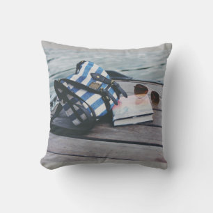 Sunglasses, Book, Purse on Dock by Lake Cushion