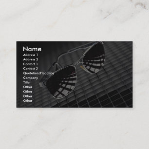 Sunglasses on grid background business card