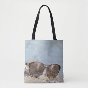 Sunglasses on the beach tote bag