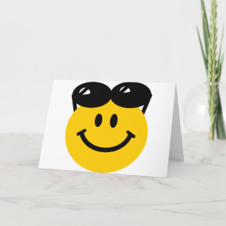 Sunglasses perched on top of head face card