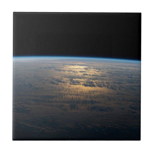 Sunglint Beams Off A Partly Cloudy South Pacific Ceramic Tile (Front)