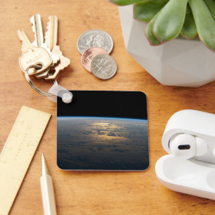 Sunglint Beams Off A Partly Cloudy South Pacific Key Ring