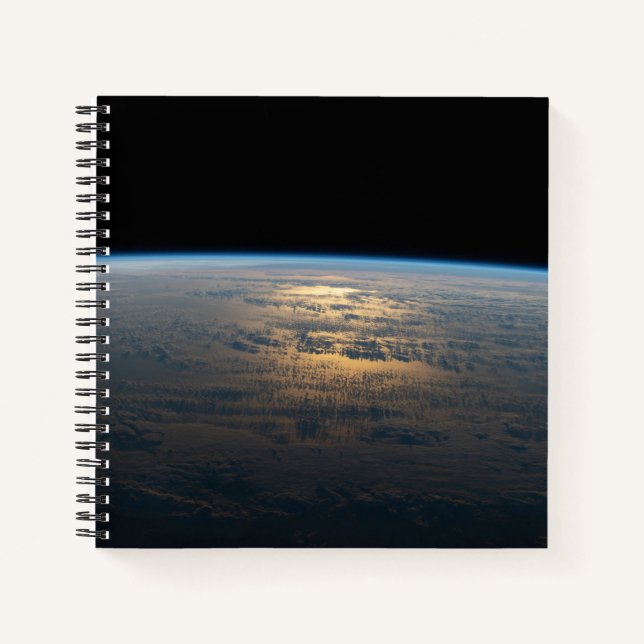 Sunglint Beams Off A Partly Cloudy South Pacific Notebook (Front)