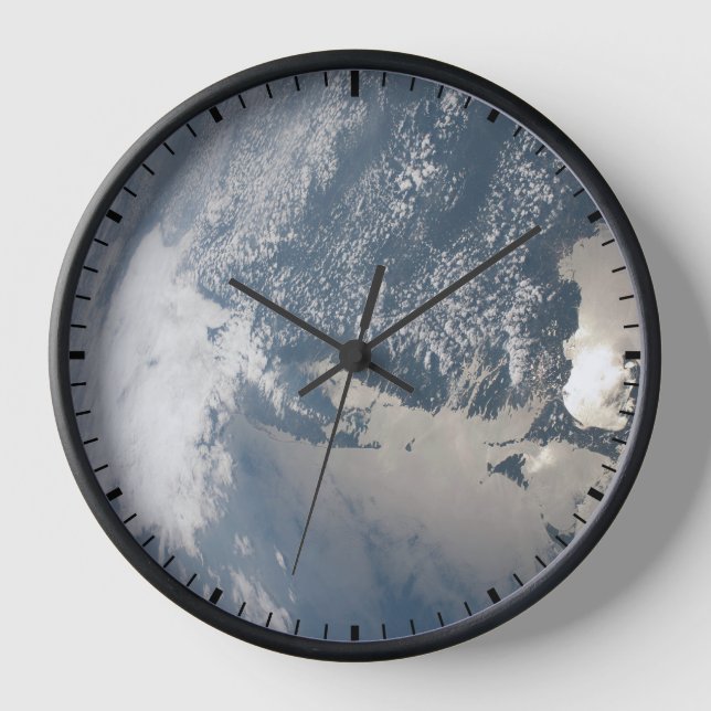 Sunglint On The Waters Of Earth. Clock (Front)