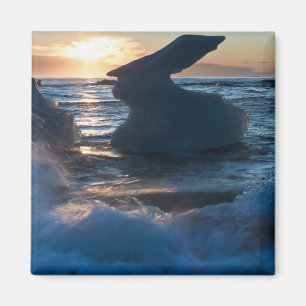 Sunrise and iceberg formation on the beach magnet