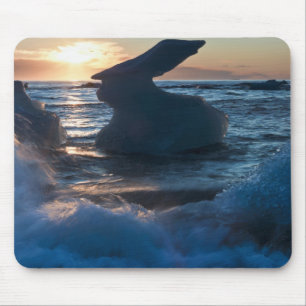 Sunrise and iceberg formation on the beach mouse pad