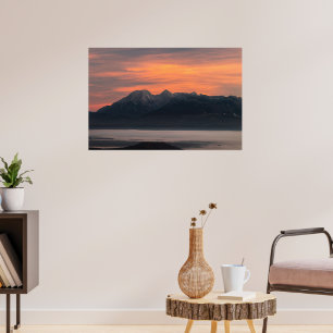 Sunrise behind majestic mountains poster