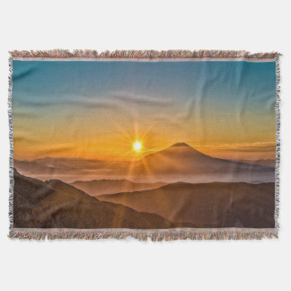 Sunrise between the hills throw blanket