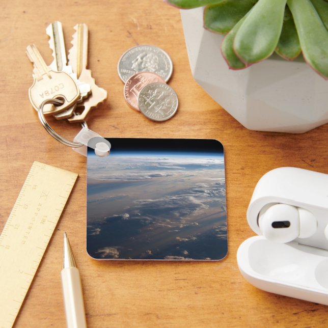 Sunrise Casts Long Shadows Over Philippine Sea Key Ring (Desk)