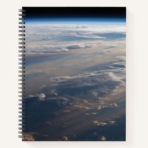 Sunrise Casts Long Shadows Over Philippine Sea Notebook