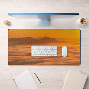 Sunrise colours and clouds desk mat