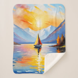 Sunrise over a lake and snow capped mountains sherpa blanket