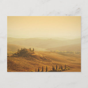 Sunrise over a landscape in Tuscany postcard
