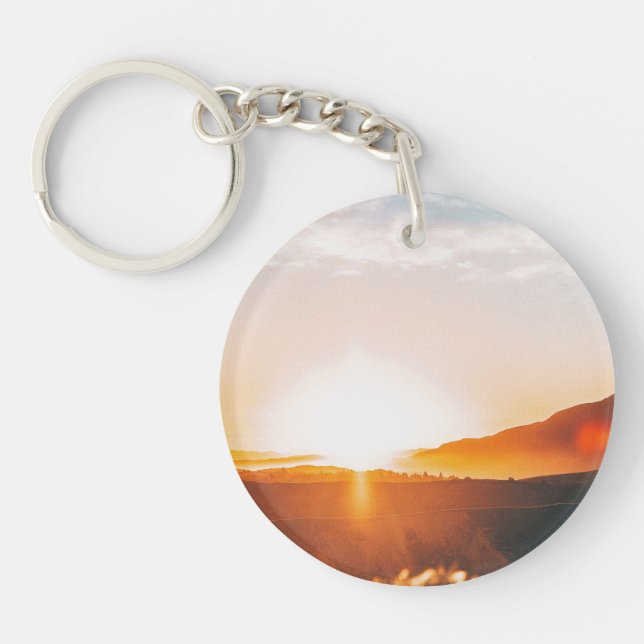 sunrise over a mountain key ring (Front)