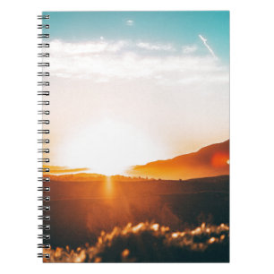 sunrise over a mountain notebook