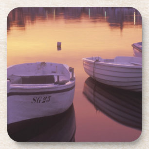 Sunrise over Stari Grad harbour with fishing Coaster