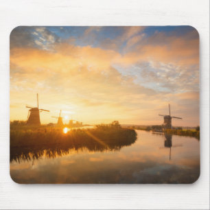 Sunrise over windmills and a river in Holland Mouse Pad