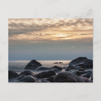 Sunset and stones on the Baltic Sea coast Postcard