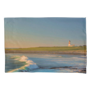 Sunset at Bay lighthouse with ocean waves evening Pillowcase