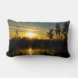 Sunset by a small lake with reed plumes. lumbar cushion