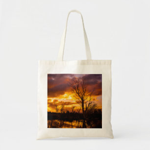Sunset by the lake tote bag