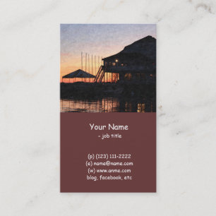 sunset by the lake waterfront with deck buildings business card