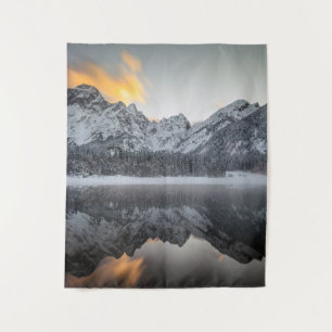 Sunset clouds over mountains at Lake Fusine, Italy Tapestry