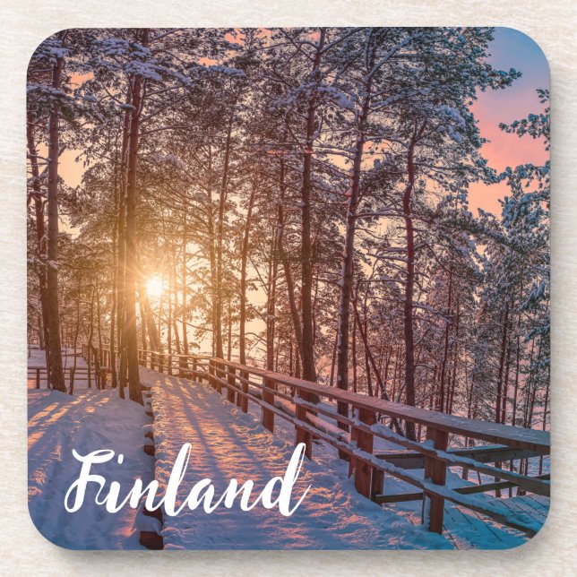 Sunset in snowy pine forest with sun ray coaster (Front)